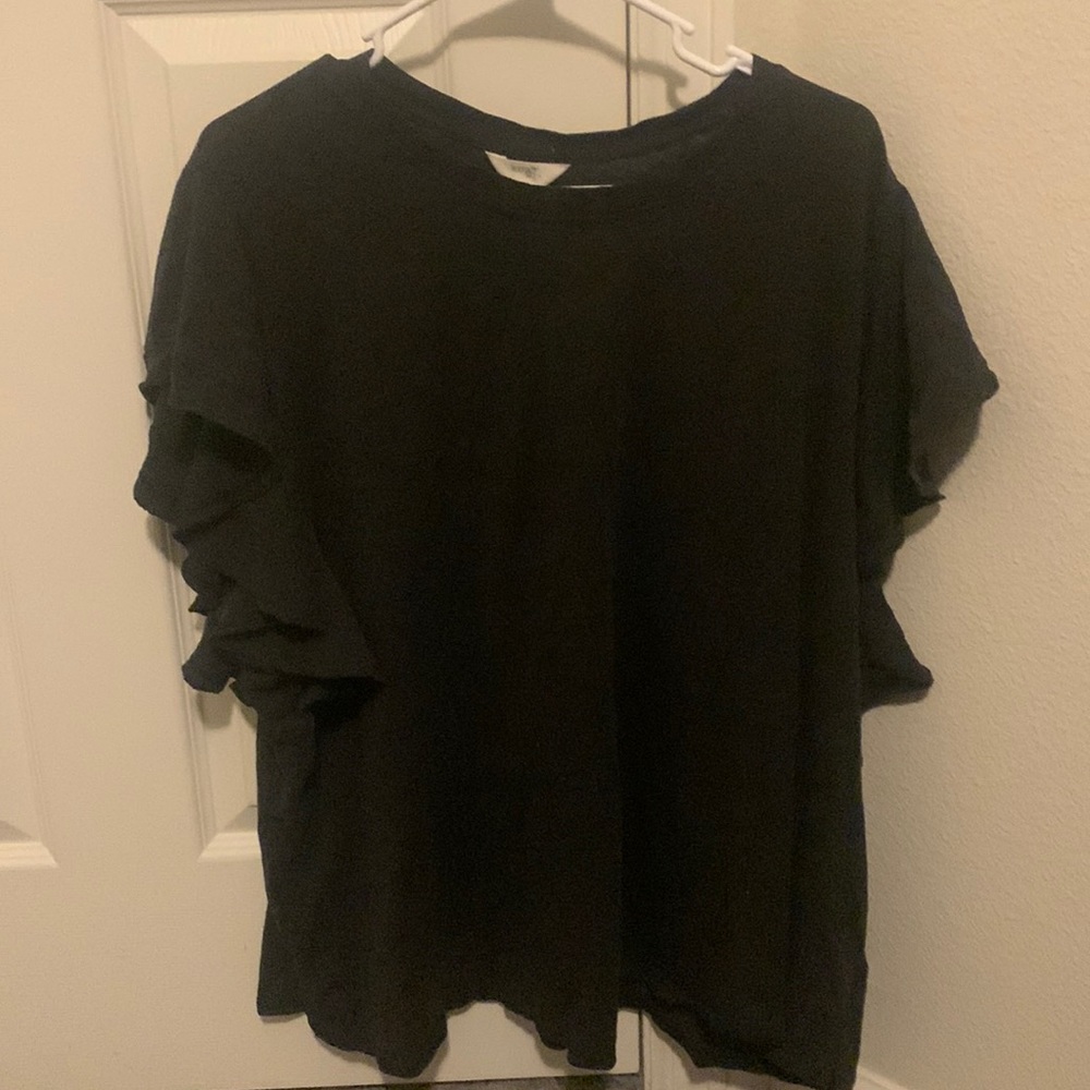 Black flowy shirt.